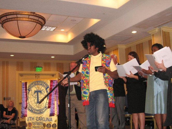 Henry takes the stage at the Spring Conference.